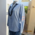 Casual iceberg blue long cuffed sleeve shirt with pretty tucked seams on front. Size 40. Used.