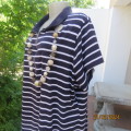 Comfy navy and white shirt style short sleeve cotton dress. Front zip opening.Knitted collar. 48