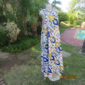 Get noticed in this wide maxi colourful strappy dress in African print. Size 36 to 38. Brand new Con