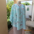 Gorgeous QUEEN DIVA size 40/16 wide halfmoon cut top in turquoise patterned.Round gathered front,