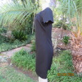 Very black richly embellished polyester vintage dress by `COVERGIRL` size 38. Long back zip. As new.