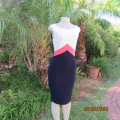 Get noticed in this textured stretch polyester colour blocked bodycon dress. Size 32/8. As new.