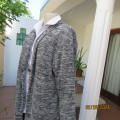 Handy black/white mottled long sleeve hooded open cardigan. Polyester stretch knit.Size 42/44 by LKA