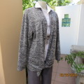 Handy black/white mottled long sleeve hooded open cardigan. Polyester stretch knit.Size 42/44 by LKA