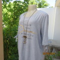 Oversized size 38 silvergrey open shoulder T Shirt. Gold/black logo. Tiestring on sleeve hems.