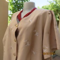 Smart Boutique made fawn colour polyester short sleeve top with pretty floral embroidery. Size 48.