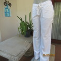 Totally on trend ivory linen/cotton blend straight legged pants Zip and drawstring waist. By NEWS 34