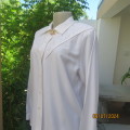 Beautiful white vintage long sleeve blouse by FASHIONETTE size 38. Lace bib on front. As new.