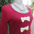 Soft dark red long sleeve angora/acrylic stretch knitted top. Cream fabric bows & frill. Size 34/10