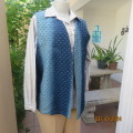 High class sleeveless waistcoat in blue shades. Back fine corduroy/front firm with holes.Size 37.