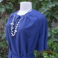 Vintage sheath dress with fabric belt. Size 44. Label cut off. Short raglan sleeves. Round neckline.