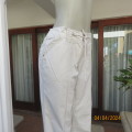 Cargo pants in buttermilk beige. 100% cotton. By REAL Clothing size 38. Drawstring waist.New cond