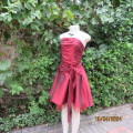 Chic garnet red polyester satin strappy dress. Ruched top front. Skater skirt. Size 36.Brand new con