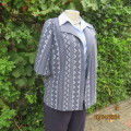 Beautiful vintage crimplene short sleeve jacket/top. Button down/shawl open collar.Size 36/12.