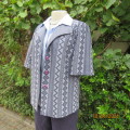 Beautiful vintage crimplene short sleeve jacket/top. Button down/shawl open collar.Size 36/12.