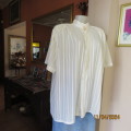 Rich cream sheer poly/viscose short sleeve top.Striped. Size 48/24. Gathered yokes. Hidden buttons