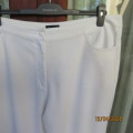 As new snow white size 44/20 straight legged pants in polyester stretch. Front pockets. Inner leg 70