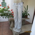 Low rise light blue polycotton stretch bootlegged denim jeans. By KELSO Petite size 38/14. Pockets.