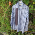 As new Men`s dress vertical striped white/blues polycotton shirt. Size XL by PADITUOLE Dubai. TIE!!