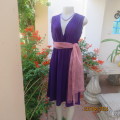 Smart casual purple stretch polyester calf length dress. Low V cross over top. Size 38. As new cond.