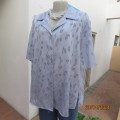 Top of the line cornflower blue short sleeve silky poly top.Size 44 by RENE TAYLOR. Opaque pattern.
