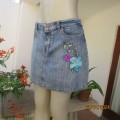 Sexy blue denim jean mini skirt size 38 by FASHION EXPRESS. Stretch cotton. Floral emb/applique patt