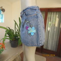 Sexy blue denim jean mini skirt size 38 by FASHION EXPRESS. Stretch cotton. Floral emb/applique patt