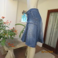 Styled blue denim 100%cotton paneled skirt with inlays.Wide rounded front yoke. size 34. Very good