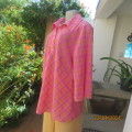 Eye catching top in orange and pink check polycotton fabric. Front 2 button opening. Size 40 to 42.