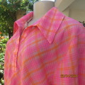 Eye catching top in orange and pink check polycotton fabric. Front 2 button opening. Size 40 to 42.