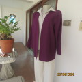 Power jacket in purple with rounded V fronts open hanging. Polycotton. Size 40. Boutique made.As new