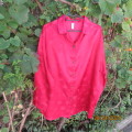 Lovely cherry red long sleeve silky poly pyjama top/embossed stars/moons. Size 40. Very good cond.