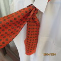 Burnt orange colour with small dark green design Men`s cravat. In silk. New condition.