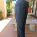 As new blue denim bootlegged jeans in polycotton stretch. Size 38. Pockets front & back. Yoked.
