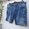 Men`s blue denim worn jean shorts in size 38. Pockets back/front. By LKA Australia. Good condition.