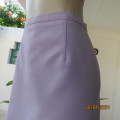 Absolute stunning lilac/silver pencil skirt/ partly elasticated back waistband.Size 46. DONNA C