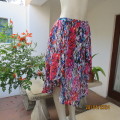 Cheerful sheer polyester gathered skirt/elastic waist. Array of colours. Size 36.Asymmetrical waist