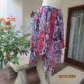 Cheerful sheer polyester gathered skirt/elastic waist. Array of colours. Size 36.Asymmetrical waist