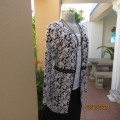 Stunning open black/white embossed long sleeve V front jacket size 36. Black edging. Never used.