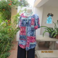 Get noticed in this patterned colour block short raglan sleeve top. Red/blue/pink.MILADYS 40. As new