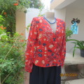 Make a statement. Apple red cream/blue floral long sleeve viscose top.Peplum/V neck. By H&M size 38