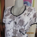 High quality QUEENSPARK capped sleeve top. Black/floral front.Black back.Size 40. Viscose stretch.
