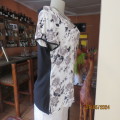High quality QUEENSPARK capped sleeve top. Black/floral front.Black back.Size 40. Viscose stretch.