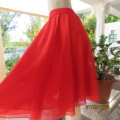 Fire up in red!! Lovely sheer polyester flare skirt fully lined. Elasticated waist. Size 36 to 38.