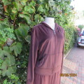 Choc brown pajama set in poly stretch velvet. Pants elasticated waist. Zip-up, hooded top.Size 40