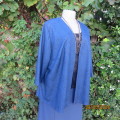 Beautiful open hanging indigo blue 100% poly coverup/top. With black rose pattern. Size 42/44.As new