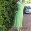 Cool bright apple green empire dress in creased polyester size 34. Sleeveless/scooped neckline.