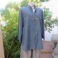 Stunning denim blue zip up top/jacket size 44. Long sleeves/front pockets.Silver stitching/accents.