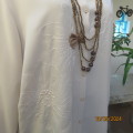 Up the luxe with this richly embroidered  front long sleeve top by CAVIAR size 40/16. Brand new cond