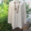 Up the luxe with this richly embroidered  front long sleeve top by CAVIAR size 40/16. Brand new cond